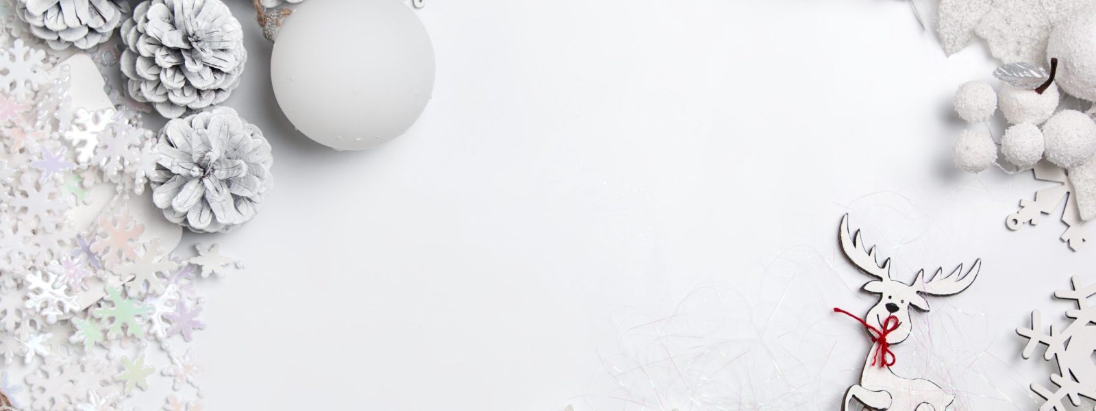Christmas decorative composition of toys on a white table background. Top view. Flat Lay
