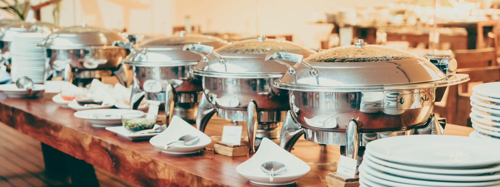 Selective focus point on Catering buffet in hotel restaurant - Vintage filter effect