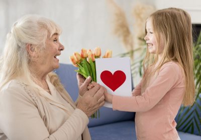 grandma-with-flowers-from-little-girl