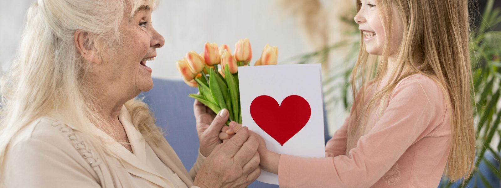 grandma-with-flowers-from-little-girl